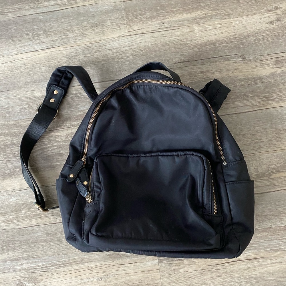 Black synthetic mini back pack